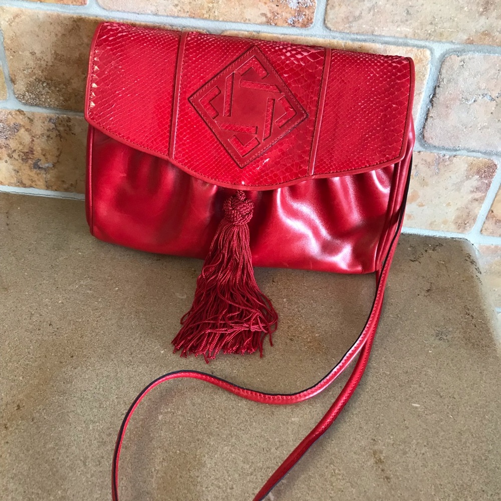 Red leather bag with snakeskin